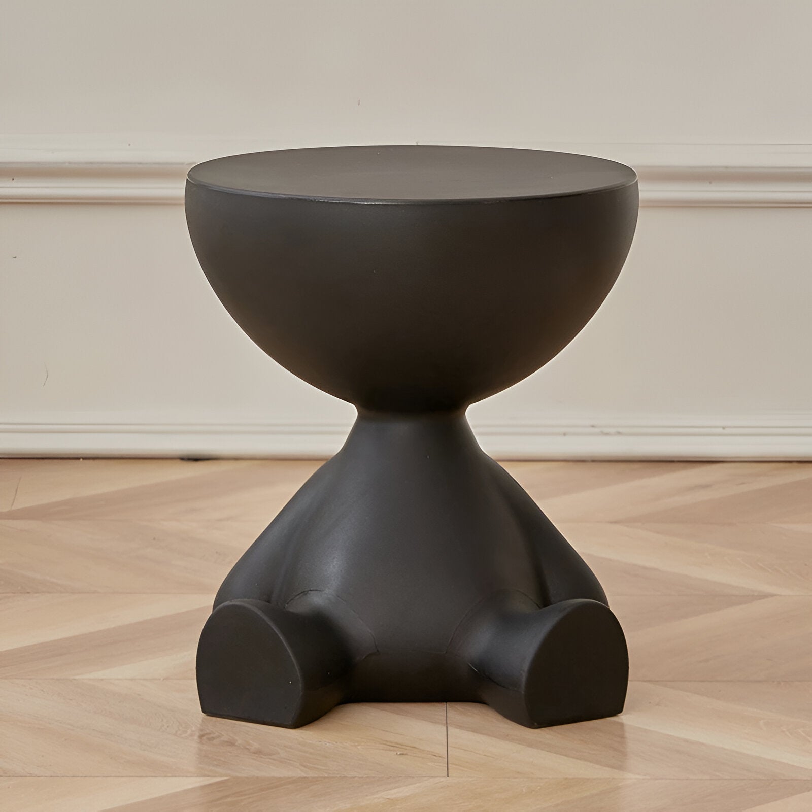 Round low table – black plastic, timeless design for living room or sitting room
