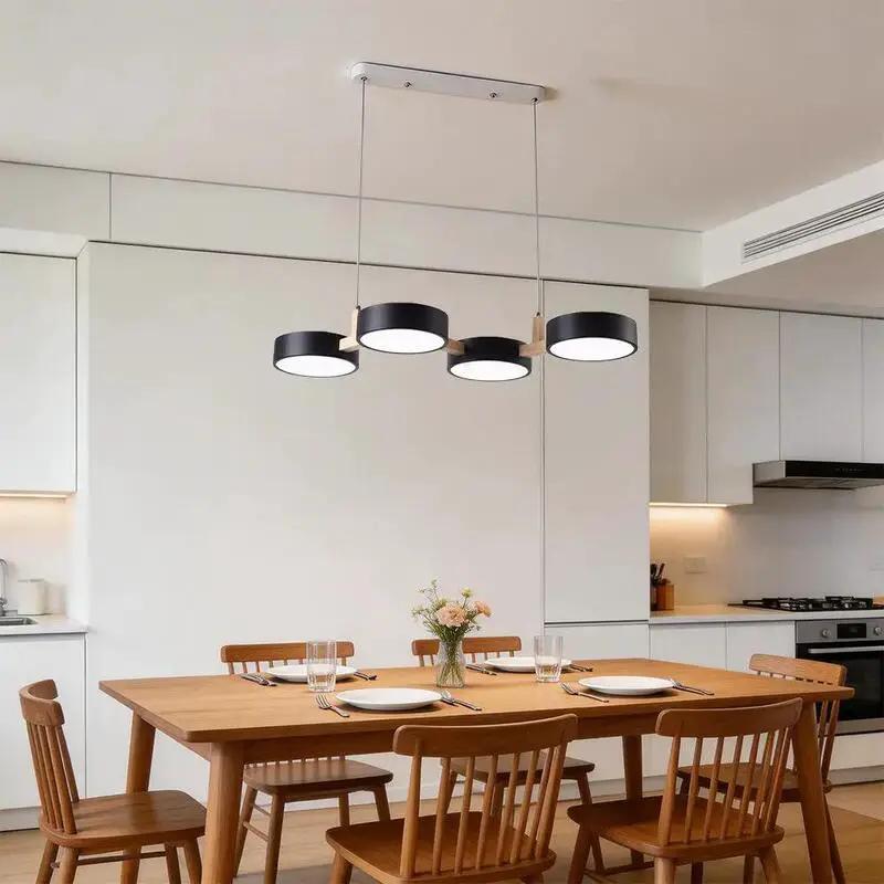 Modern linear pendant ceiling light with black LED shades and natural wood details for kitchen lighting (10795371266381)