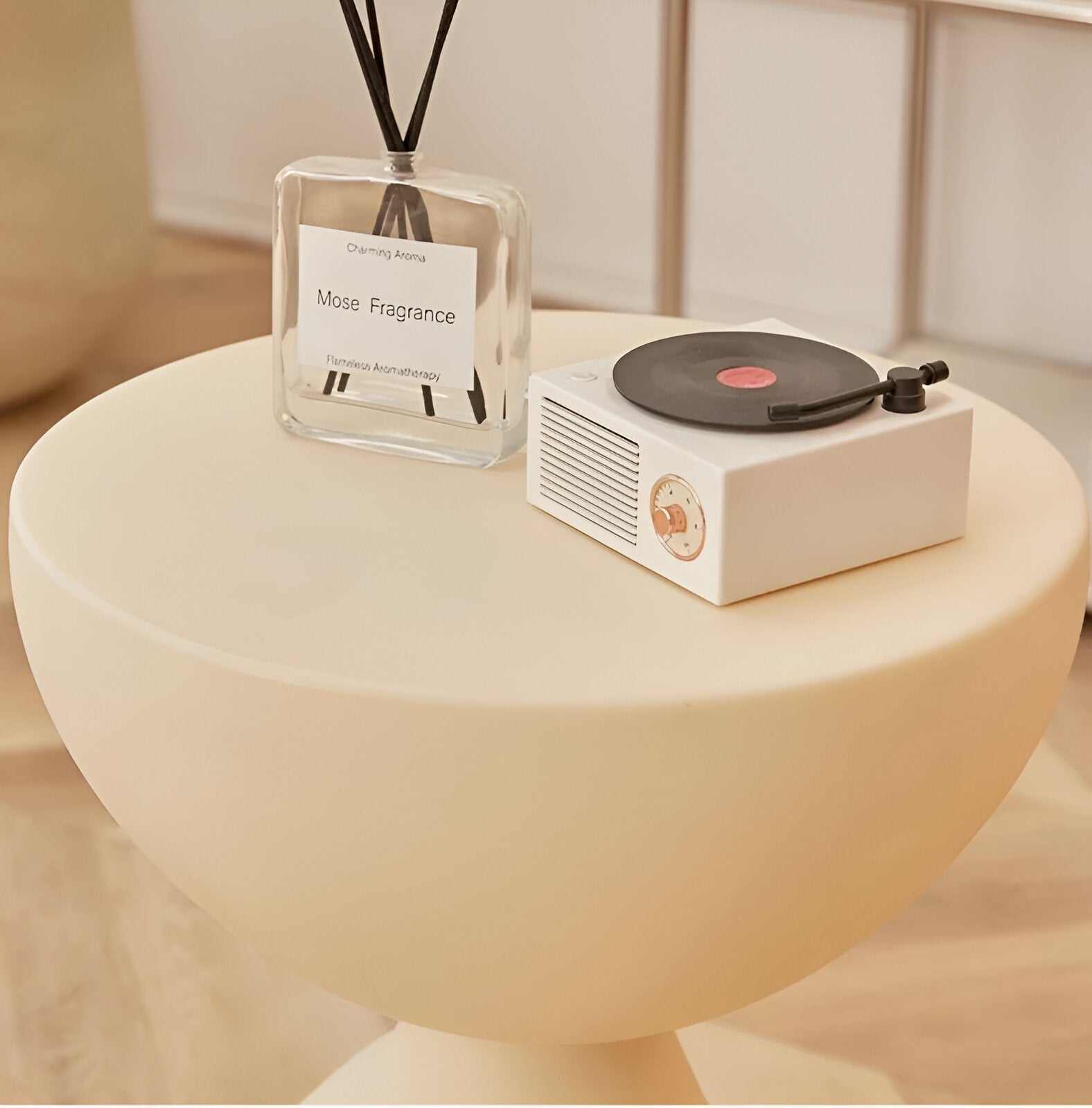 Round low table – black plastic, timeless design for living room or sitting room