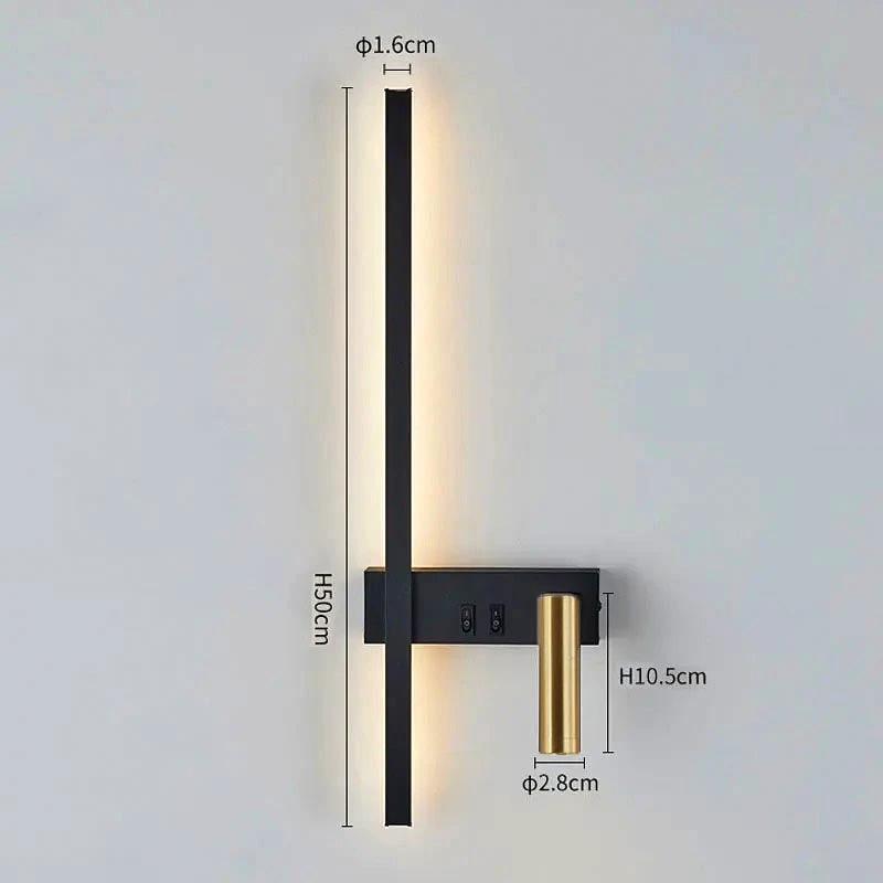 SVEA – Swivel LED Wall Light, black wall-mounted fixture with brass cylindrical accent.