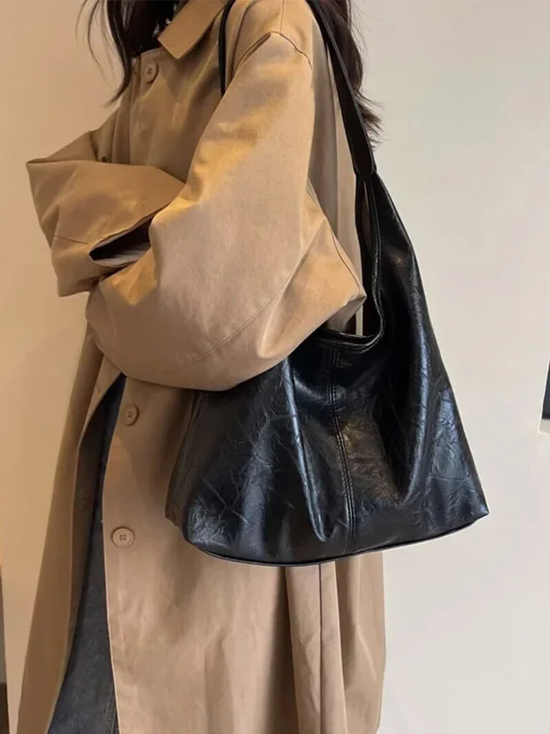 Skuldertaske i læder til kvinder med minimalistisk design - luksustilbehør til daglig brug