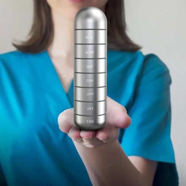 Pill Box – Portable 7-day organizer in a compact design for home use or travel