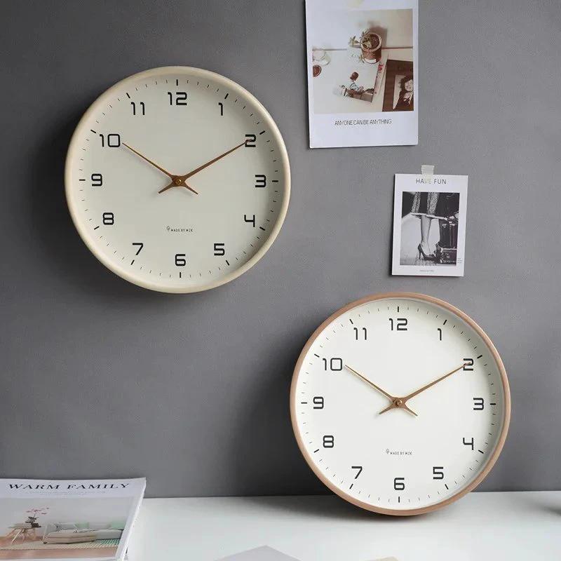 Nordic Wooden Wall Clock - Minimalist Silent Timepiece, cream-faced clock with wooden frame; two clocks on a grey wall.
