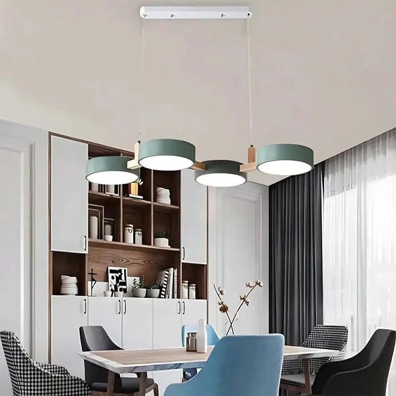 Scandinavian kitchen island pendant light with green circular LED shades and soft ambient illumination (10795371266381)